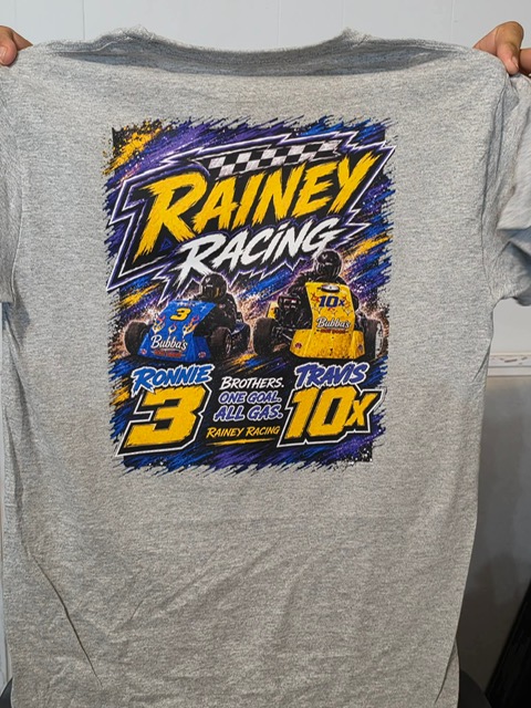 Team T-Shirt back — the real printed sport-gray shirt with the full Rainey Racing design: both karts, Ronnie 3 and Travis 10X, Brothers. One Goal. All Gas.