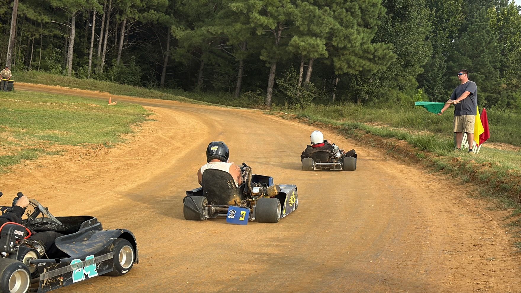Ronnie's blue 3 kart taking the green flag at Camden Speedway
