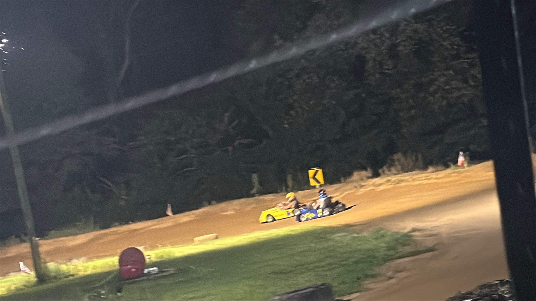 Travis's yellow 10X and Ronnie's blue 3 side by side under the lights