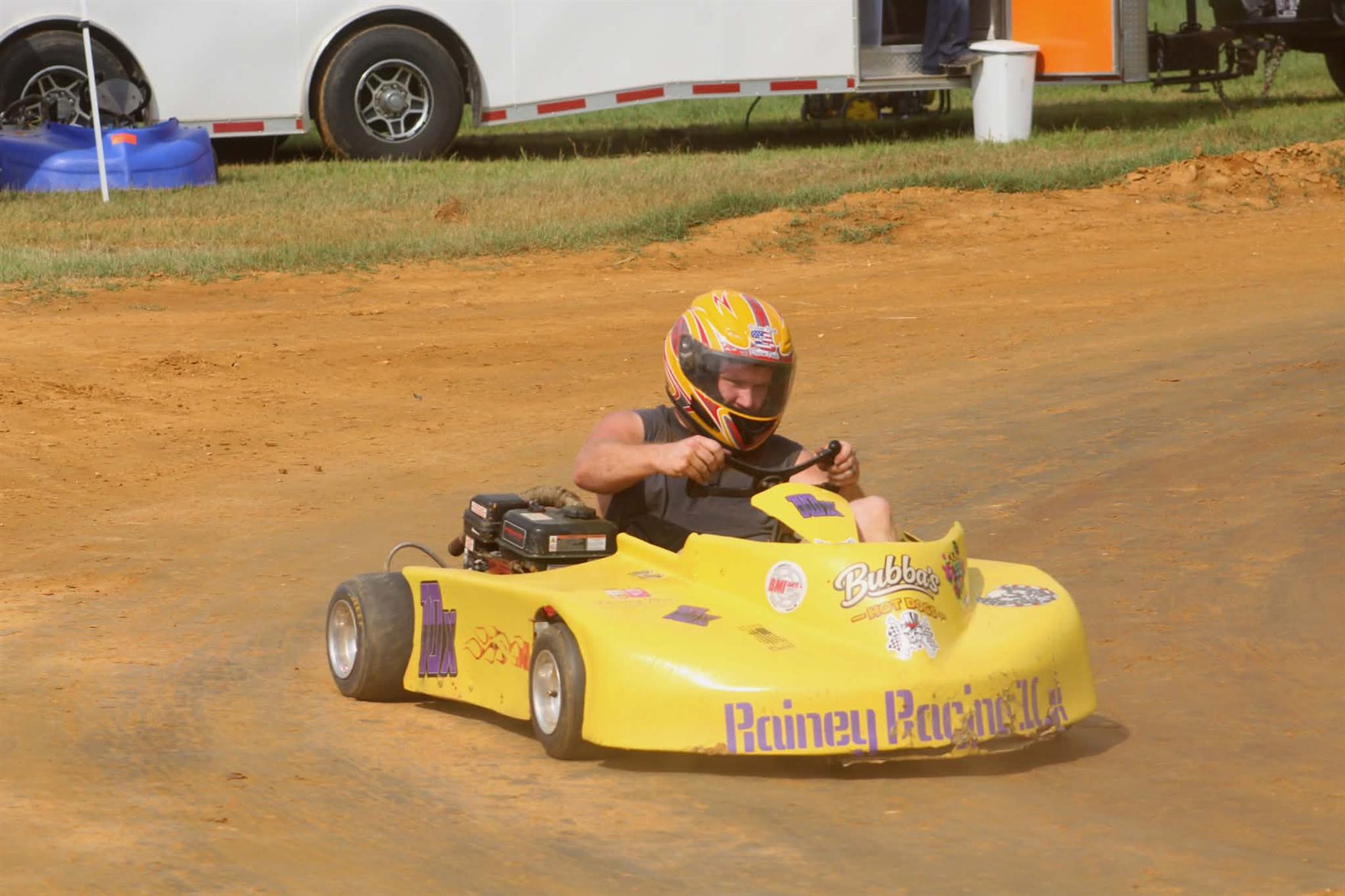 The yellow 10X running the dirt past the haulers at Camden Speedway