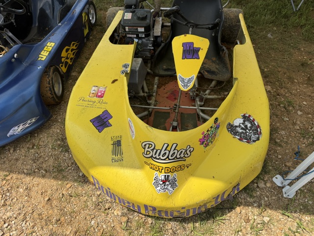 The nose of the yellow 10X kart showing the Bubba's Hot Dogs, Pouring Rein and BBB Creations decals